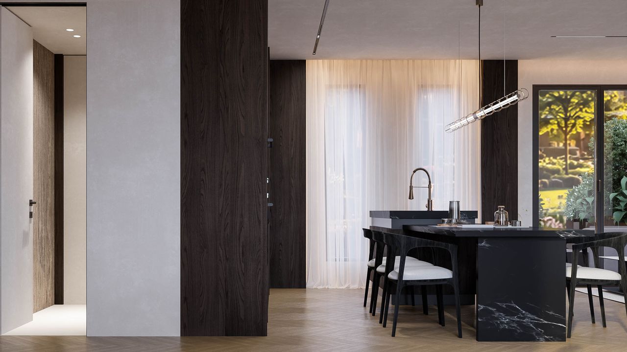 Concept pentru biroul de vânzări: capătul insulei cu aspect de piatră neagră cu vinișoare, lustră din tuburi de sticlă și o ușă de sticlă spre o grădină.