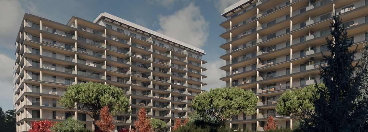 Vedere largă de la nivelul străzii a clădirilor B3 (stânga) și B2 (dreapta), cu copacii grădinii în fața lor și între ele.